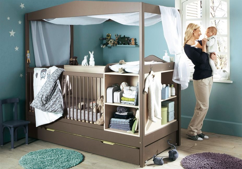 Mueble para la habitación del bebé con cuna